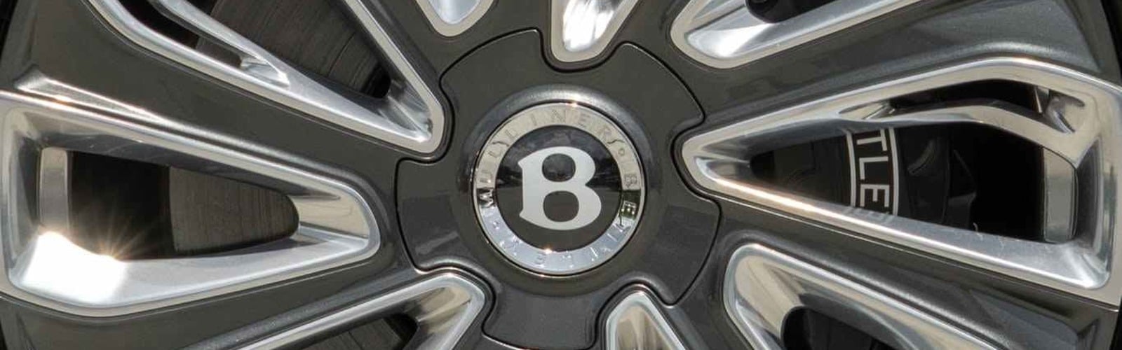 Bentley Continental GT in the service bay at Presidential Auto Sales & Service in Delray Beach, Florida, near Boca Raton