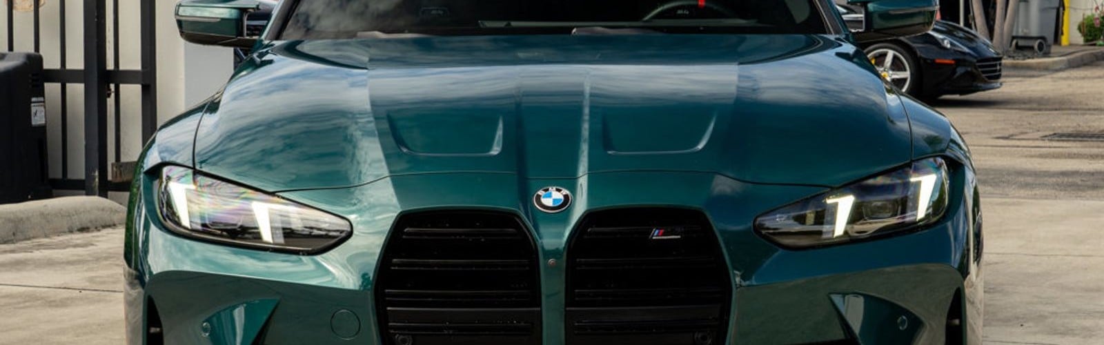 Front grille and headlights of a BMW M4 serviced in Delray Beach, FL
