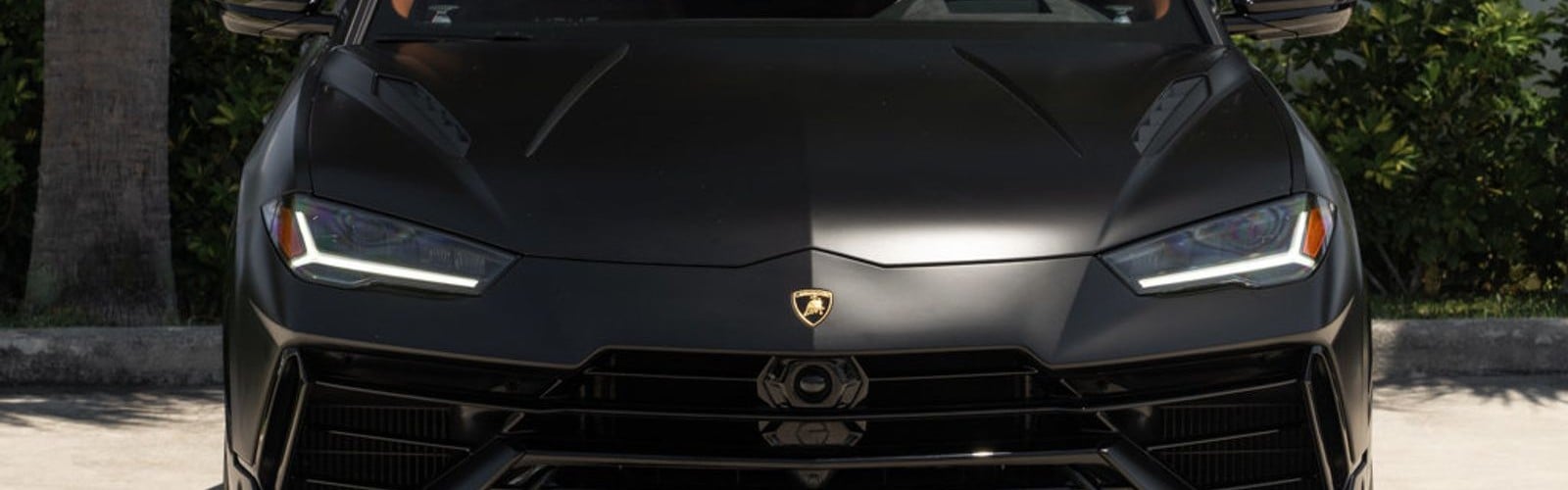 Front view of a Lamborghini Urus S ready for exotic car service in Delray Beach, FL