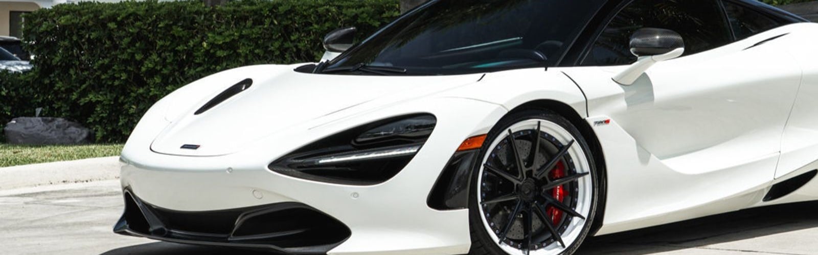 Front three-quarter view of a McLaren 720S ready for service in Delray Beach, FL